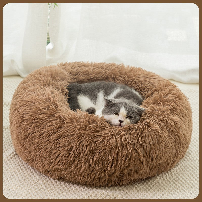 COJA Halo calming donut bed in Khaki, a warm tan long-pile faux fur bed with a raised bolster rim